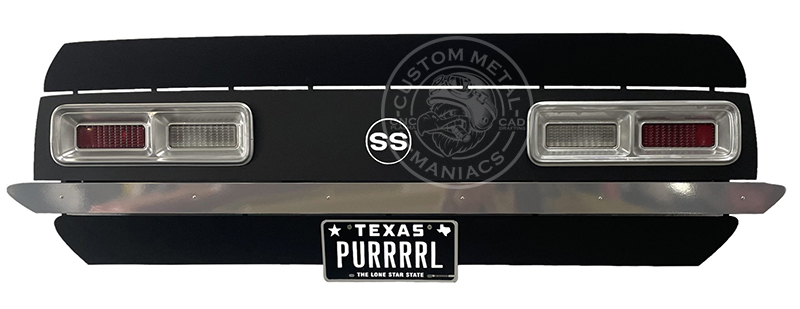 rear bumper of a black camaro vehicle with a license plate reading "purrrl"